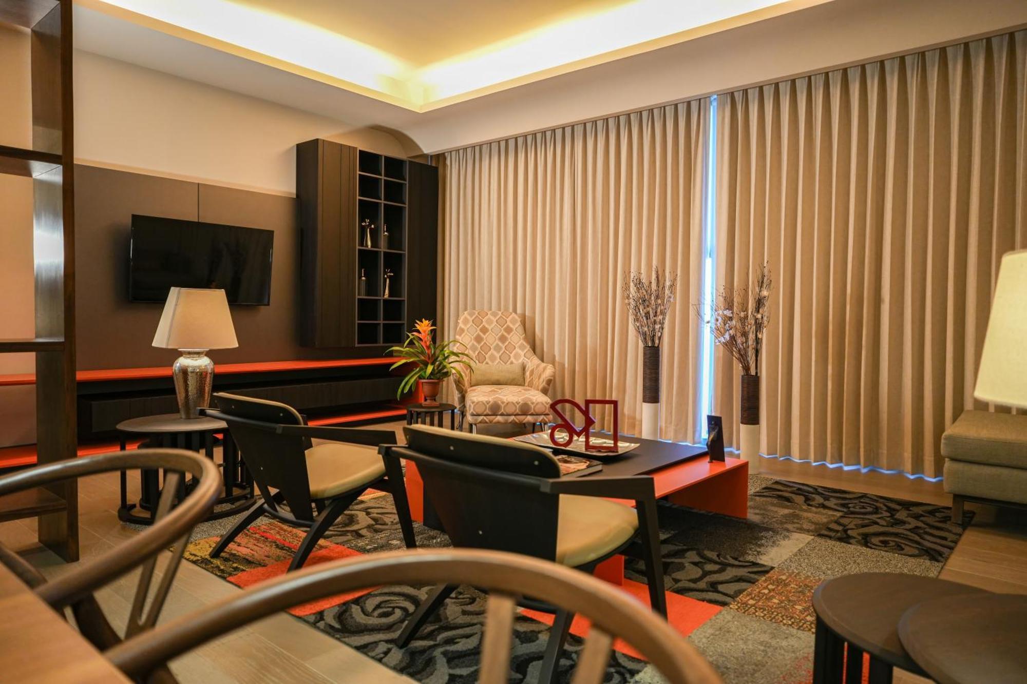 Metria Hotel León Zewnętrze zdjęcie A living room in a condominium